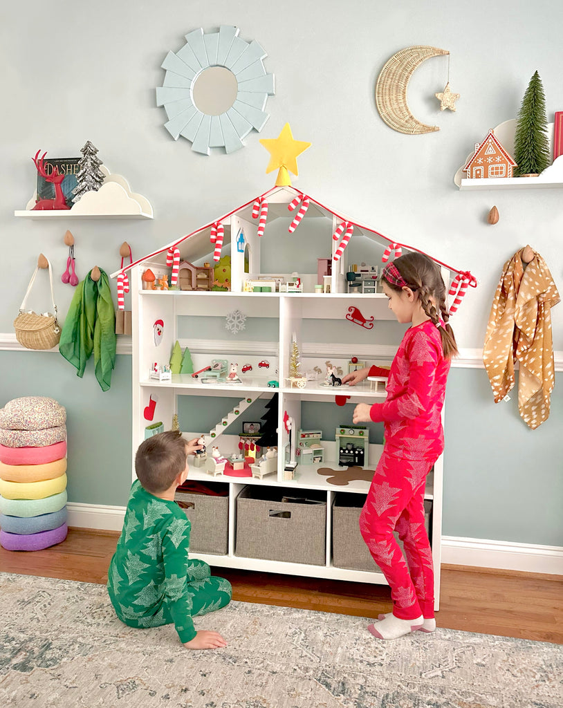 Kids playing at Martha Stewart Dollhouse Bookcase