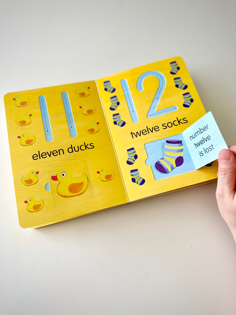 "1, 2, 3 Count With Me", an interactive numbers 1-20 book, with tracks to trace and flaps to flip.