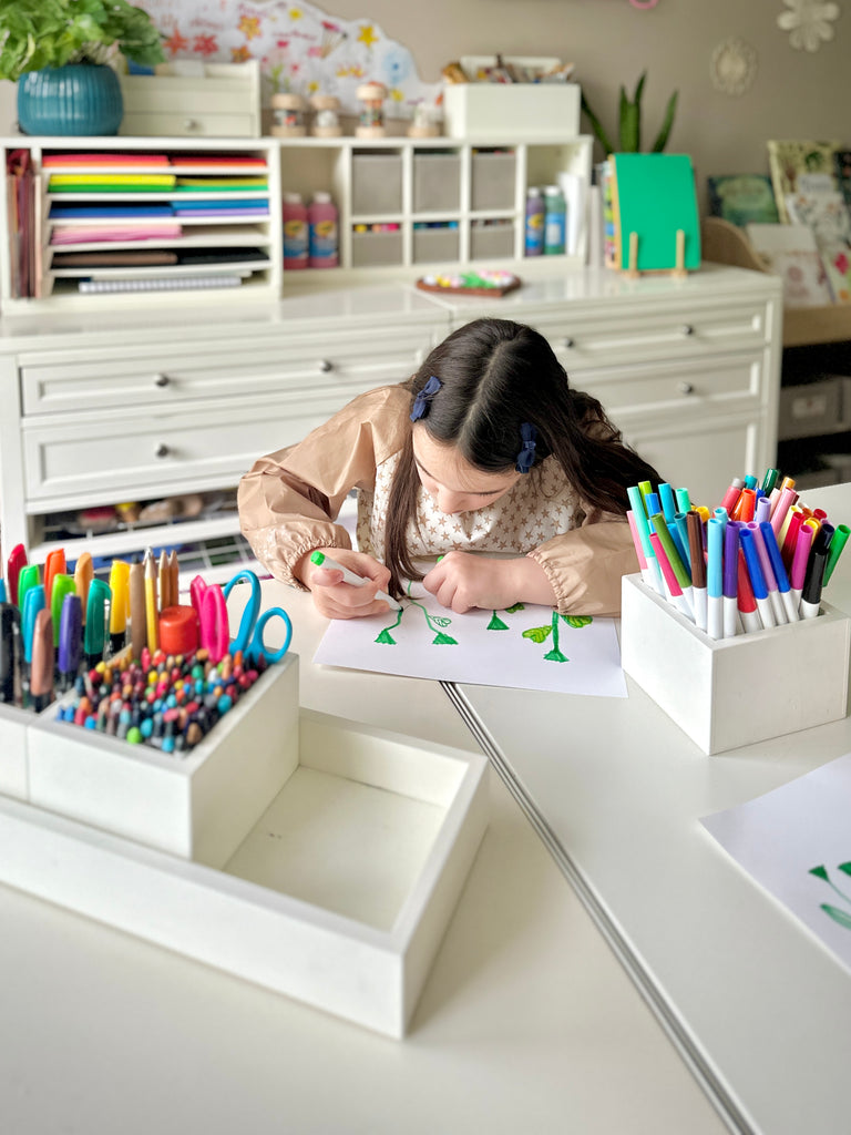 Girl using marker from Martha Stewart Crafting Kids' Accessory Tray