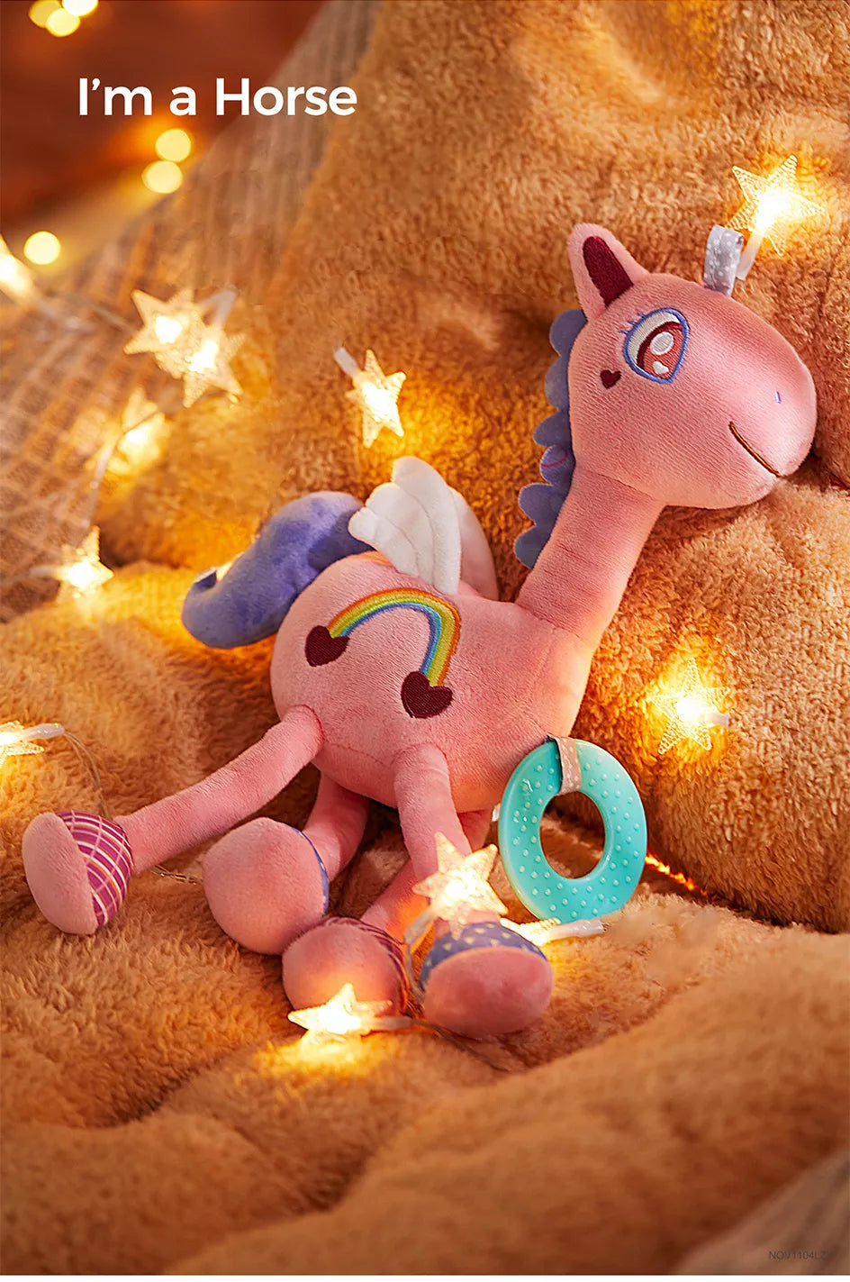 Baby girl_s crib horse plush and rattle