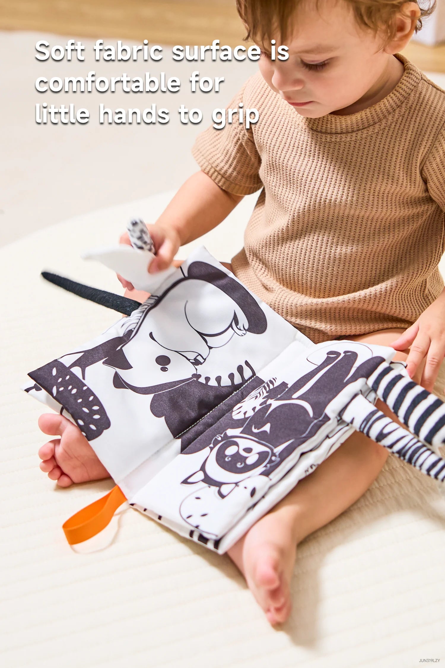Crinkle cloth book with black and white patterns for baby stimulation