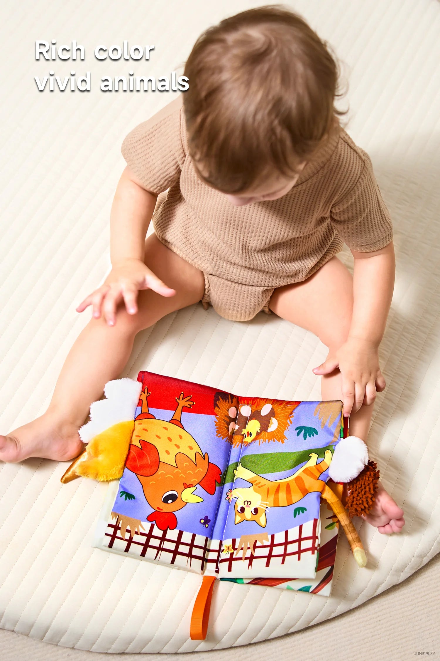 Early interactive development toy featuring soft busy tail book for babies