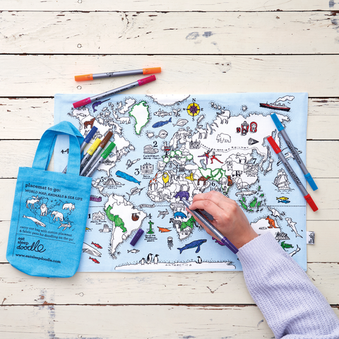 Image depicting a colour in kids placemat with world map and sea animals design to colour-in and wash out