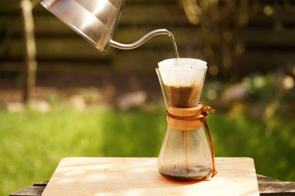 Brewing fresh roasted coffee with funnel