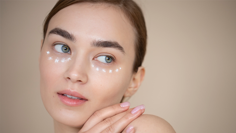 girl uses the best eye cream for dark circles and puffiness