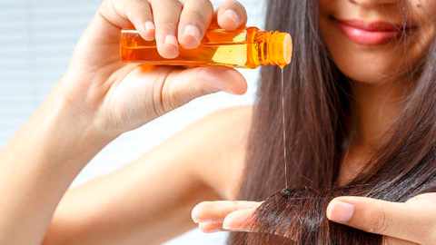 girl uses hair loss oil