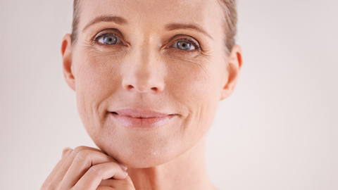 Girl uses anti-aging creams for wrinkles