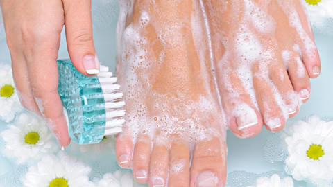 A girl uses the best feet care products products 