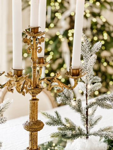 vintage gold candelabra with white tapered candles