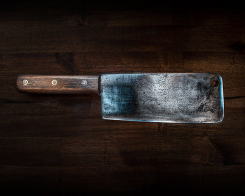 Stainless steel meat cleaver with a wooden handle