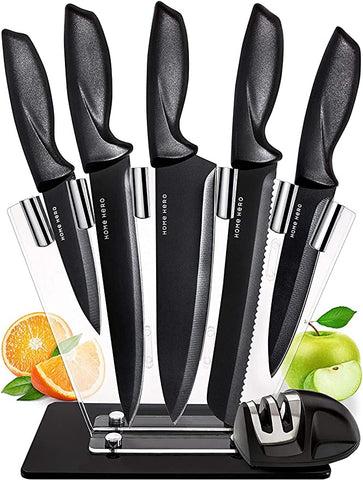 Five kitchen knives along with knife sharpener
