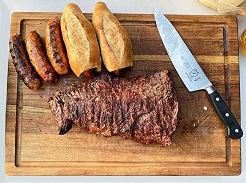 Knife on a wooden chopping board