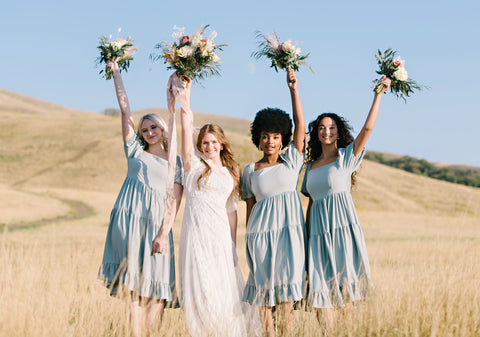 modest bridesmaid dresses for your bridal party. Tiered skirt with pouf sleeve and square neckline.