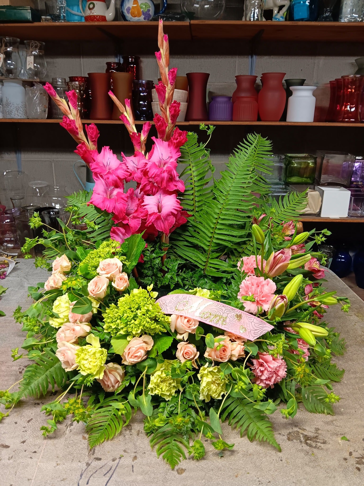 Urn arrangement by Mary Ann's Flowers & Gifts