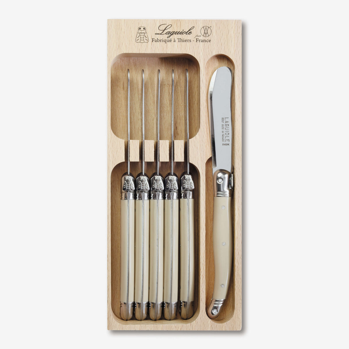 https://cdn.shopify.com/s/files/1/0614/9131/4841/products/k55w-laguiole-butterknife-set-ivory-pack-6_1200x.jpg?v=1662623421