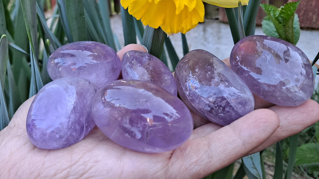 image of amethyst tumble stone. this healing crystal is available at dumi's crystals
