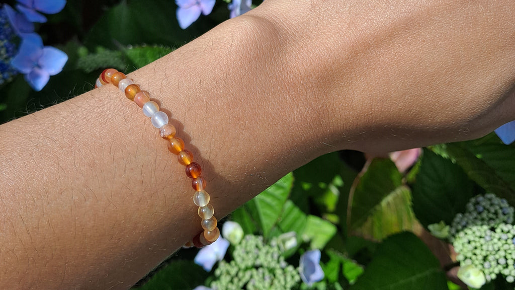 image of carnelian bracelet made with 4mm round beads. This bracelet is available at dumi's crystals
