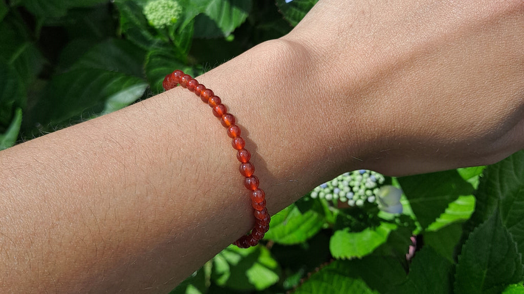 image of a carnelian bracelet made with 4mm beads. this healing crystal is available at dumi's crystals