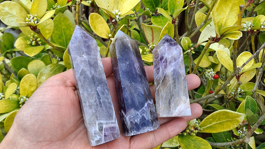 Image of chevron amethyst towers. This healing crystal is available at dumi's crystals