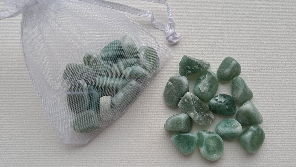 image of green aventurine chips. this healing crystal is available at dumi's crystals