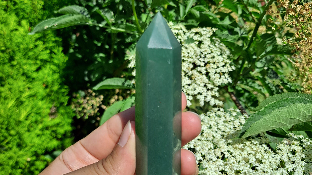 image of a green aventurine tower. this healing crystal is available at dumi's crystals