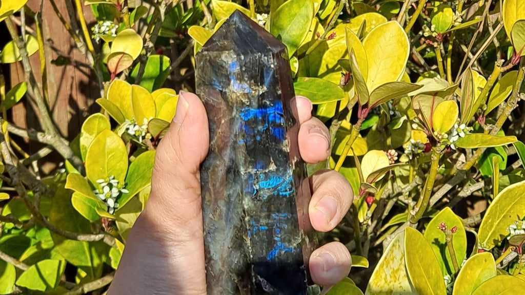image of a labradorite tower. this crystal is available at dumi's crystals