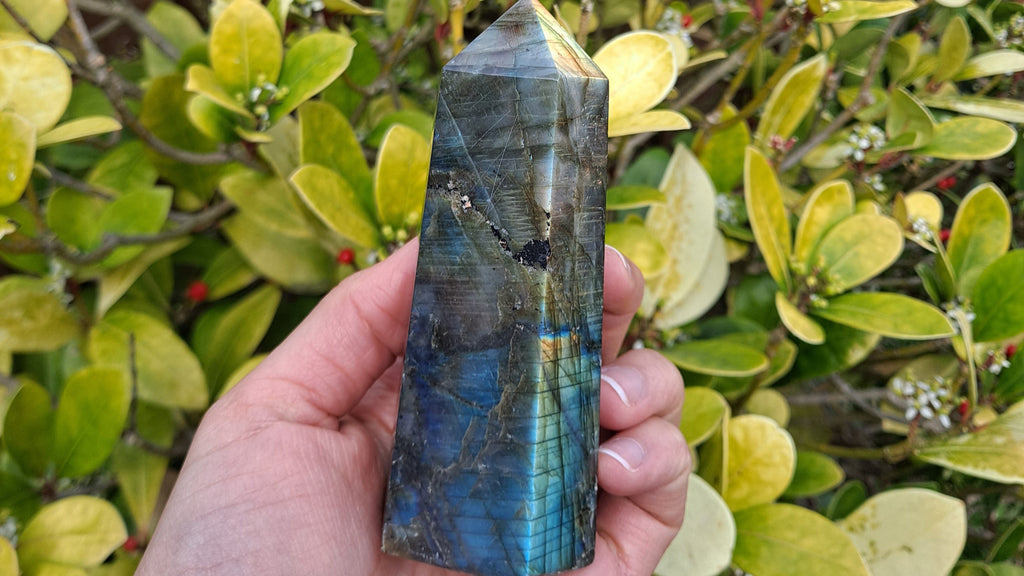 image of a labradorite tower. this healing crystal is available at dumi's crystals