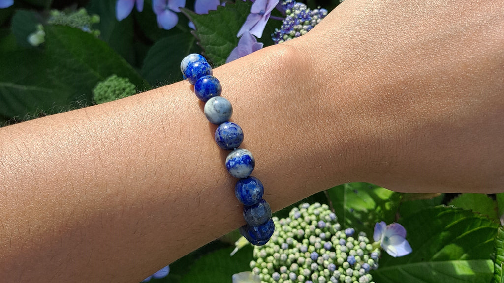 image of a lapis lazuli 8mm beads bracelet. this healing crystal is available at dumi's crystals