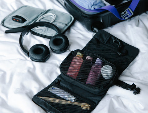 Travel toiletries and headphones live in my luggage