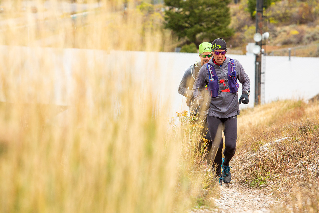 Two Men Running on a trail