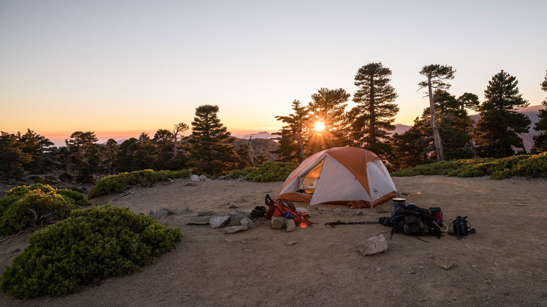 Tent at sunset in the mountains