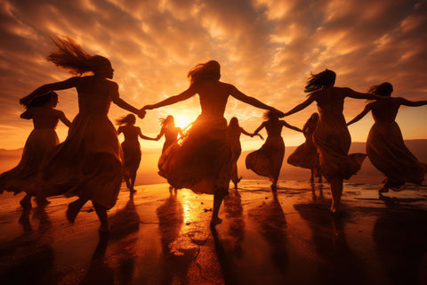 women dancing with hannah meorah on the beach at sunset in south florida boca raton