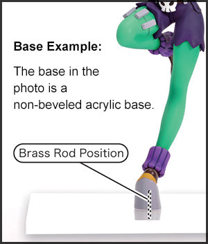 Image showing rod positioning to secure figure to base. The rod is placed slightly right of center on foot.