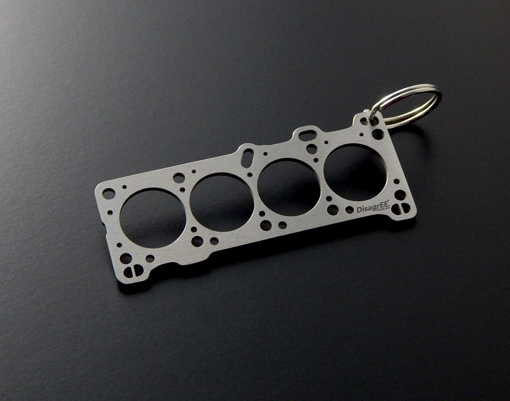 Miniature of a Head Gasket for Alfa Romeo Busso V6 Keychain Stainless Steel  brushed – DisagrEE
