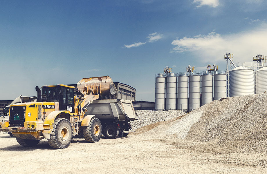 truck collecting drainage gravel