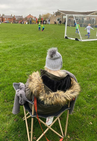 Kirsty watching her son play football six days post-op