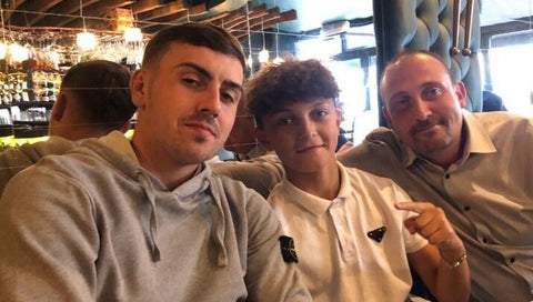 Oscar with his brother Harry and dad