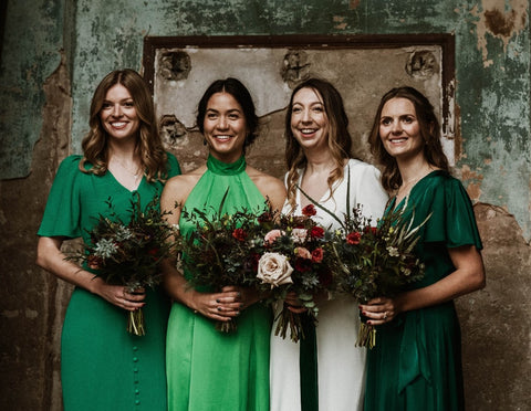 Rachel with her bridesmaids on her wedding day