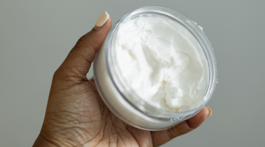 jar of white facial cream