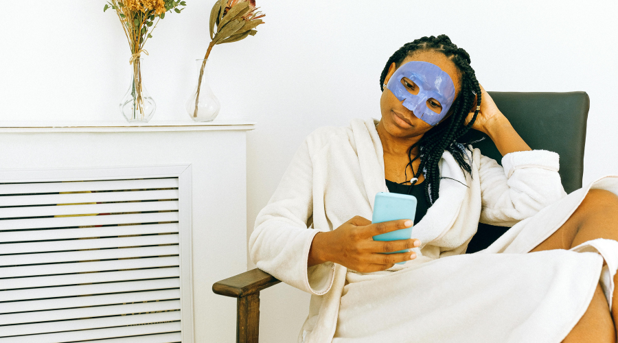 woman doing at home spa routine in robe