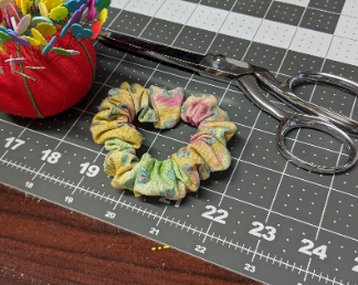 A scrunchie made with dress making fabric scraps