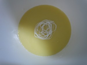 Adding the White Lip Balm Color to the raw soap.