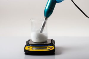 After heating, using an immersion blender to mix