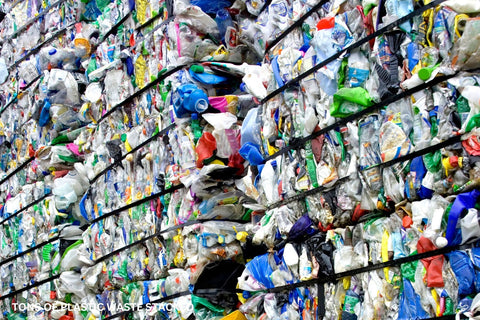 tons of plastic waste stacked to be recycled. better to use biodegradable products from natural fibers, it's durable and save more money and energy.