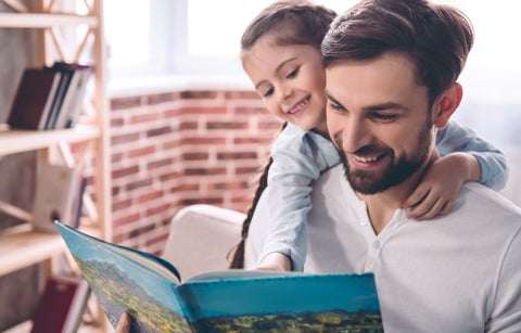 Father and daughter reading