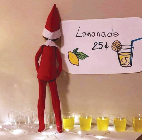 Elf peeing making lemonade