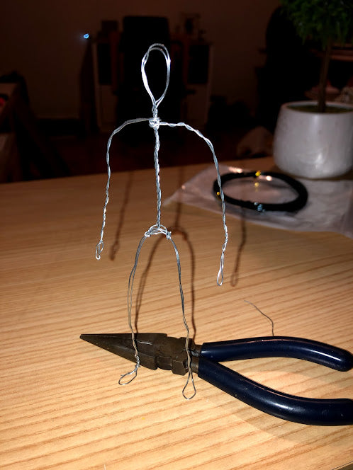 Wire frame of action figure.