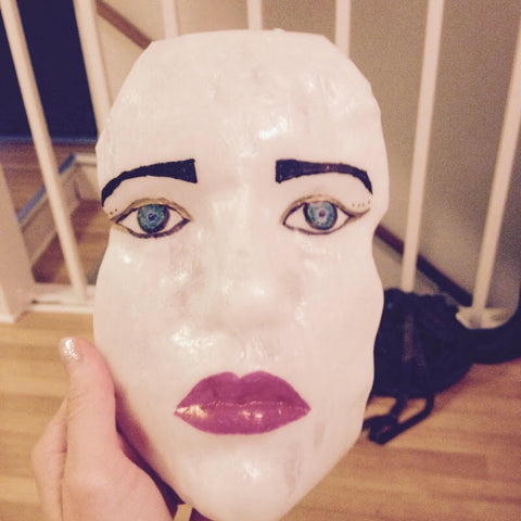 Front view of a mask made with InstaMorph moldable plastic. The mask is full face and is colored with Sharpie markers.