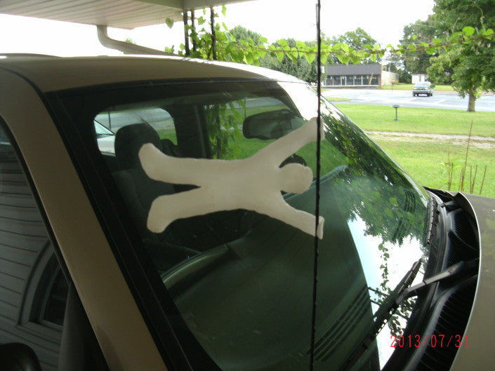 Car antenna decoration in the shape of a person made with InstaMorph moldable plastic.