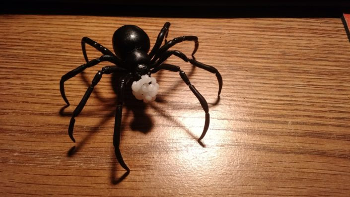 Black widow spider sculpture model made with InstaMorph moldable plastic.